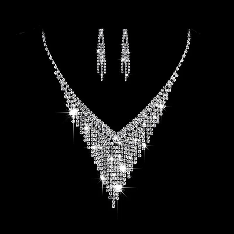 https://ae01.alicdn.com/kf/S4da84088d4ae4a63a532ca17a79a16a3f/Luxury-Crystal-Tassel-Bride-Jewelry-Set-Rhinestone-V-Shape-Silver-plated-Wedding-Dress-Banquet-Necklace-Earring.jpg
